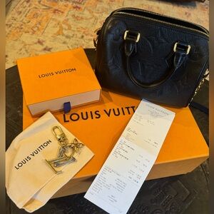 Louis Vuitton speedy bag + bag charm
